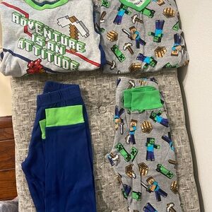 Minecraft Themed Pajama Set . This comes in 3 sets, all size 8 . Gently used.